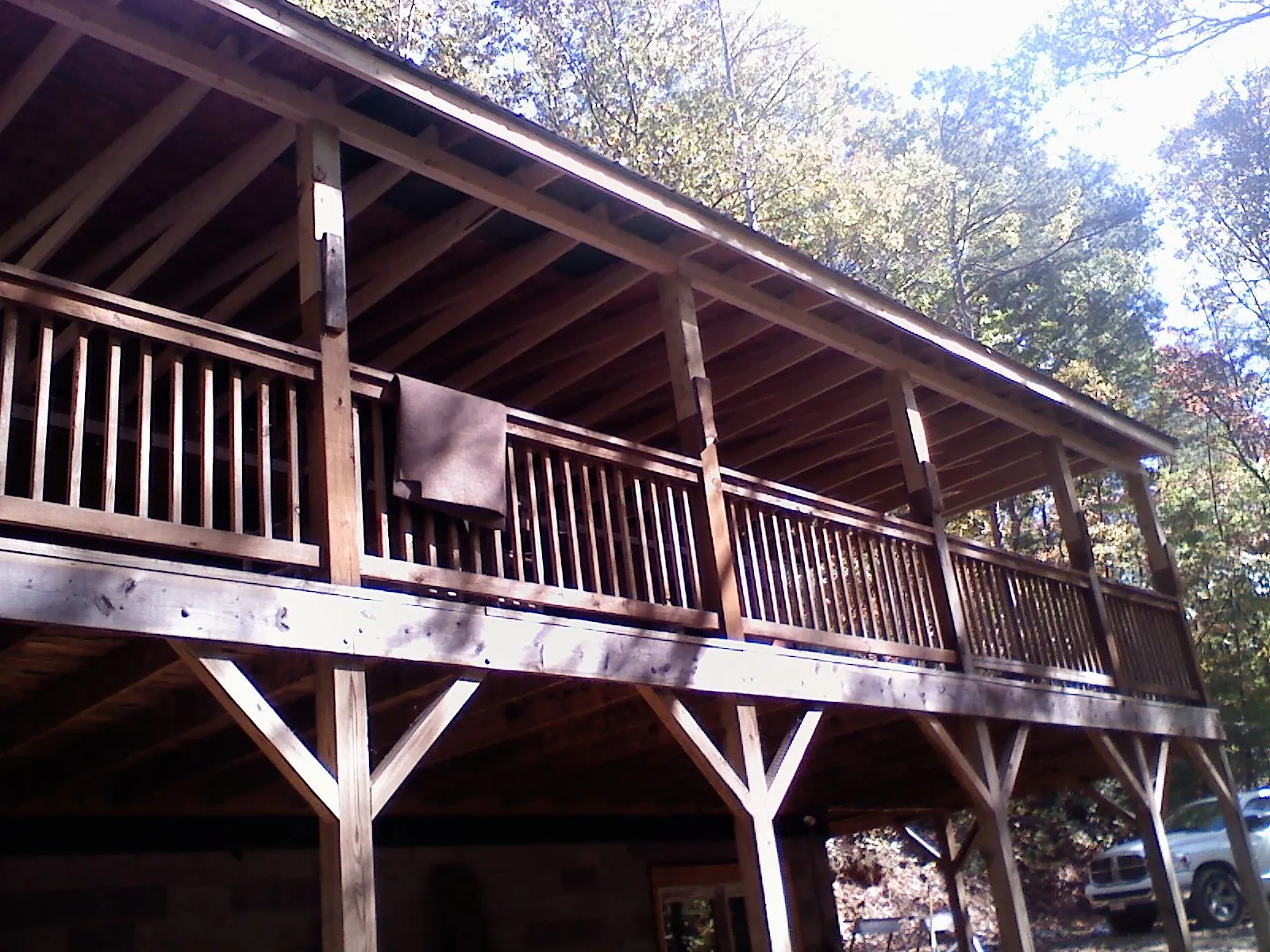Timber framing under a new elevated porch and deck — Roof Leak Repair in Norwich by Roofing Brothers
